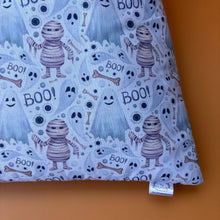 Load image into Gallery viewer, Halloween mummy and ghosts cosy snuggle cave. Padded stay open snuggle sack. Hedgehog bed. Fleece pet bedding.