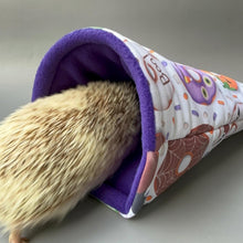 Load image into Gallery viewer, Halloween mummy and ghosts cosy snuggle cave. Padded stay open snuggle sack. Hedgehog bed. Fleece pet bedding.