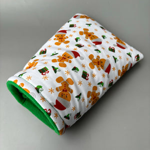 Christmas gingerbread man cosy snuggle cave. Padded stay open snuggle sack. Hedgehog bed. Fleece pet bedding.