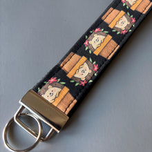 Load image into Gallery viewer, Hedgehog in plant pot wristlet keychain. Hedgehog keyring. Hedgehog wrist strap keyring.