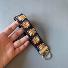 Load image into Gallery viewer, Hedgehog in plant pot wristlet keychain. Hedgehog keyring. Hedgehog wrist strap keyring.